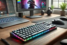 A modern wireless keyboard with customizable RGB lighting on a clean desk, featuring a gaming setup in the background. The scene emphasizes the keyboard's design and versatility for both productivity and gaming.