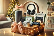"A well-curated technology gift basket with gadgets like wireless earbuds, a power bank, a smart speaker, and other accessories, presented with decorative LED lights."