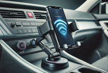 "An automatic cell phone holder mounted in a car, securing a smartphone with infrared sensors. The phone is in the holder, and the arms have automatically closed around it, offering hands-free functionality in a modern car interior."