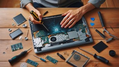 "Person replacing a broken laptop screen using screwdriver and replacement parts on a desk – DIY laptop screen repair"