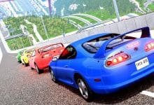 Colorful Toyota Supra cars lined up on a steep racetrack in a realistic racing simulator game, showcasing a high-speed virtual environment with detailed graphics and elevation.